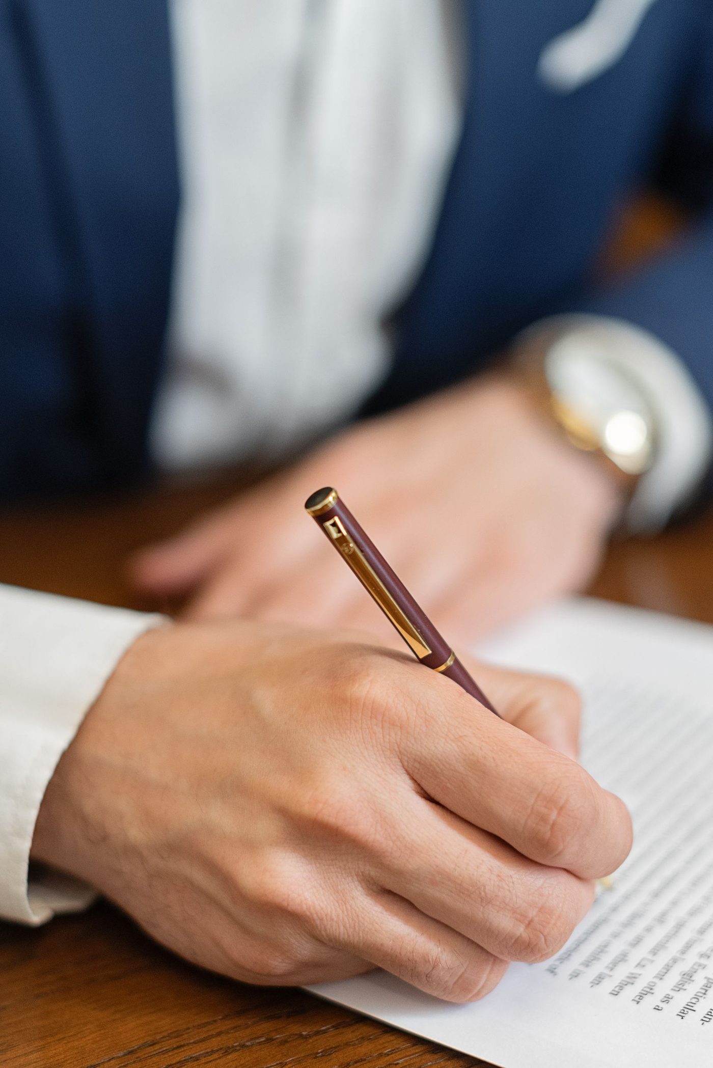 Consultant signing a document